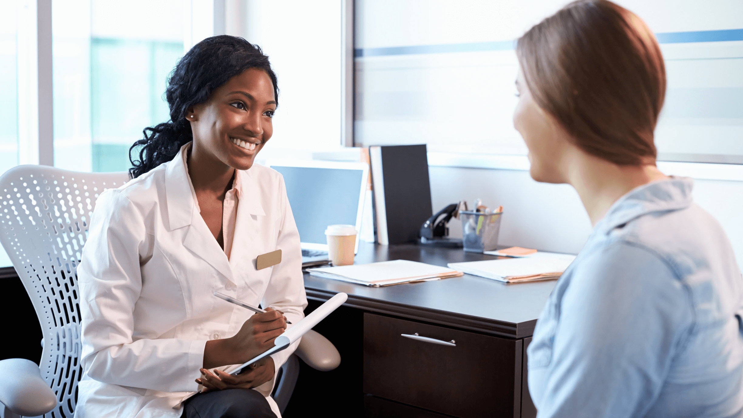 woman consulting with doctor